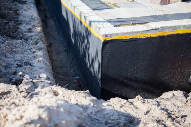 Professional Interior Drainage System technician working in New Liberty, KY
